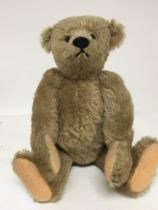 A mid 20th century Steiff bear hinged limbs with g