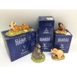 Four boxed Royal Doulton Disney Showcase figures.