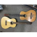 Four acoustic guitars. Shipping category D.