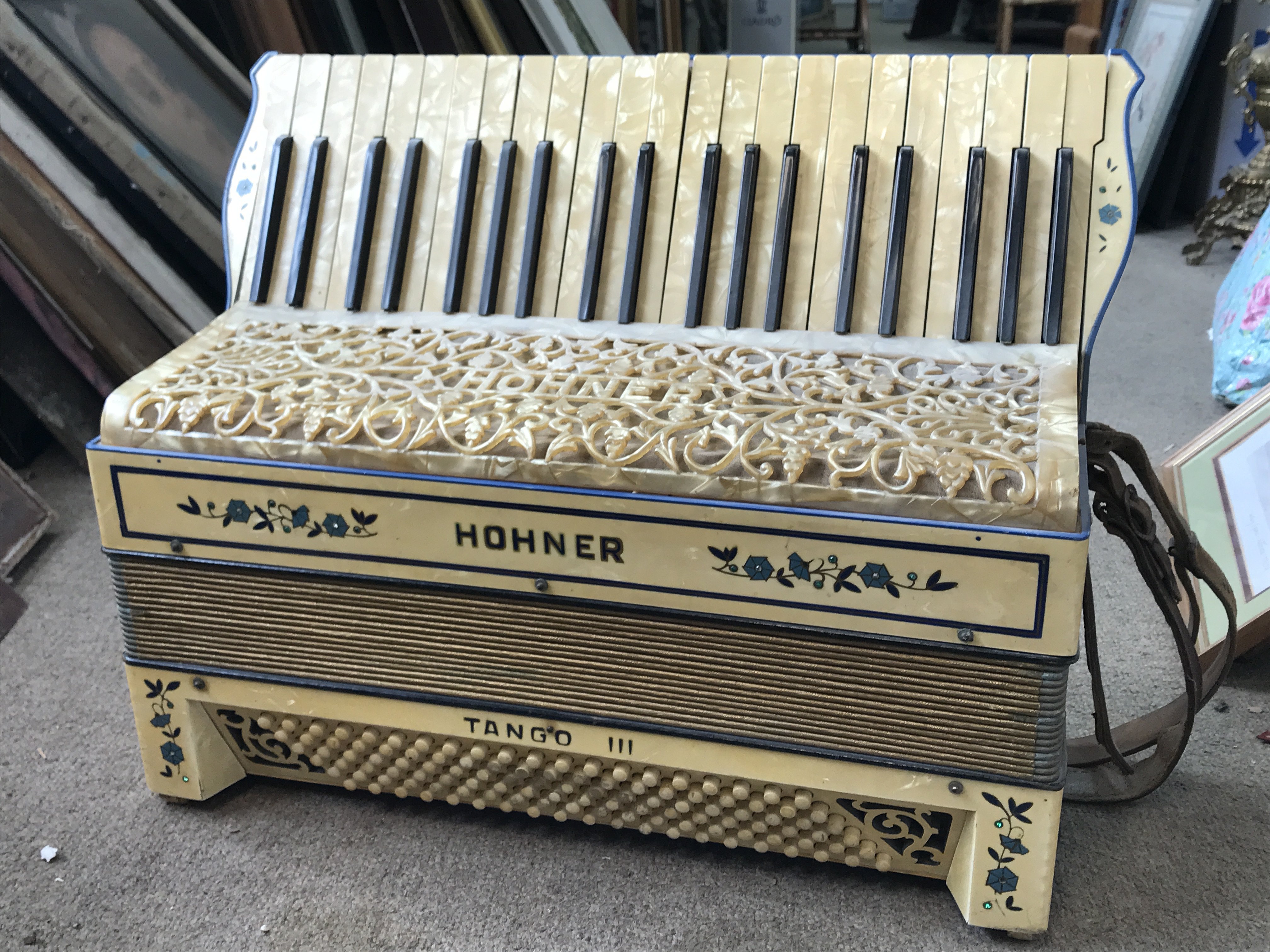 Two Hohner accordions including a Hohner Tango III and a cased Hohner. This lot cannot be posted