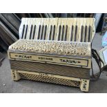 Two Hohner accordions including a Hohner Tango III and a cased Hohner. This lot cannot be posted