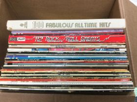 A box of LPs by various artists including Elvis Pr