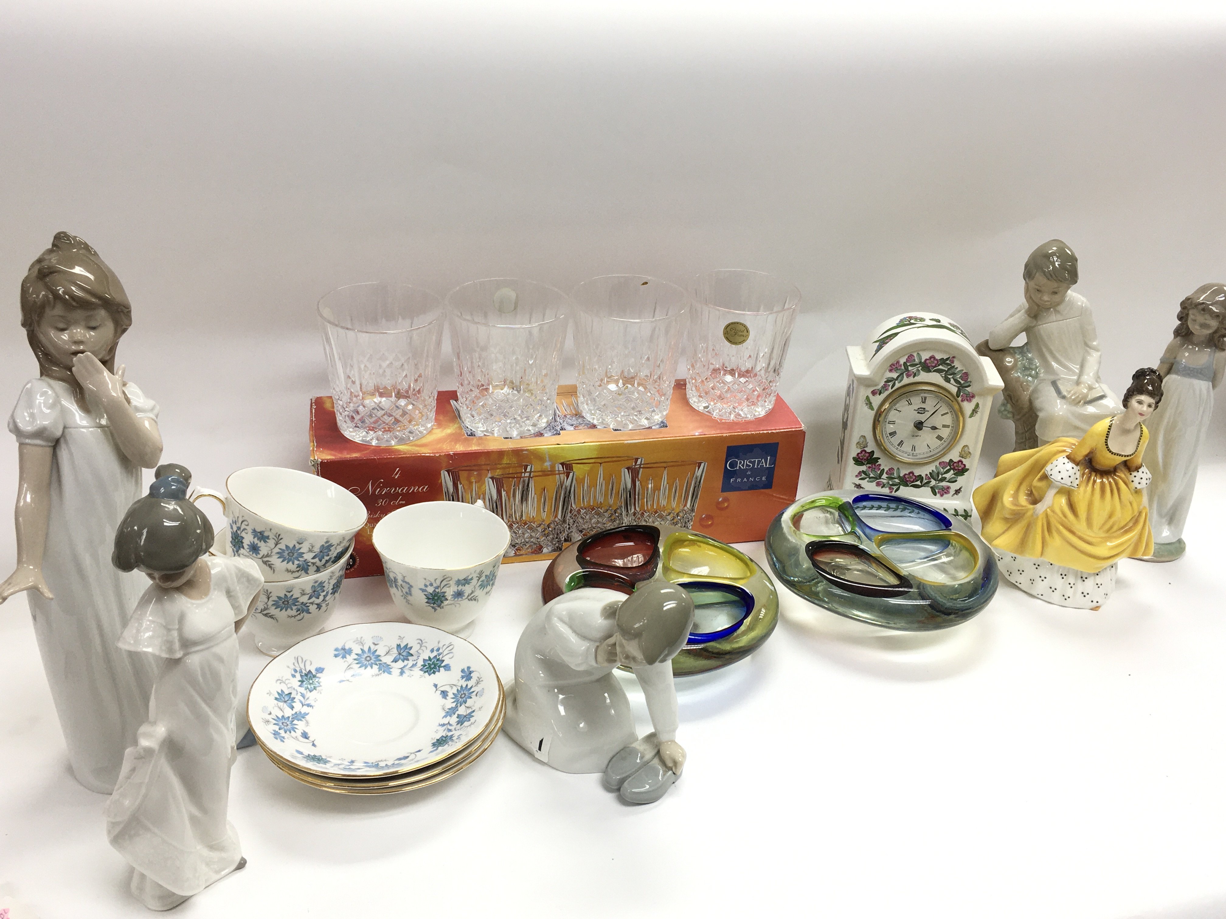 A collection of ceramics including Lladro and Nao