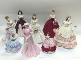 Eight ceramic figures of ladies comprising Royal W