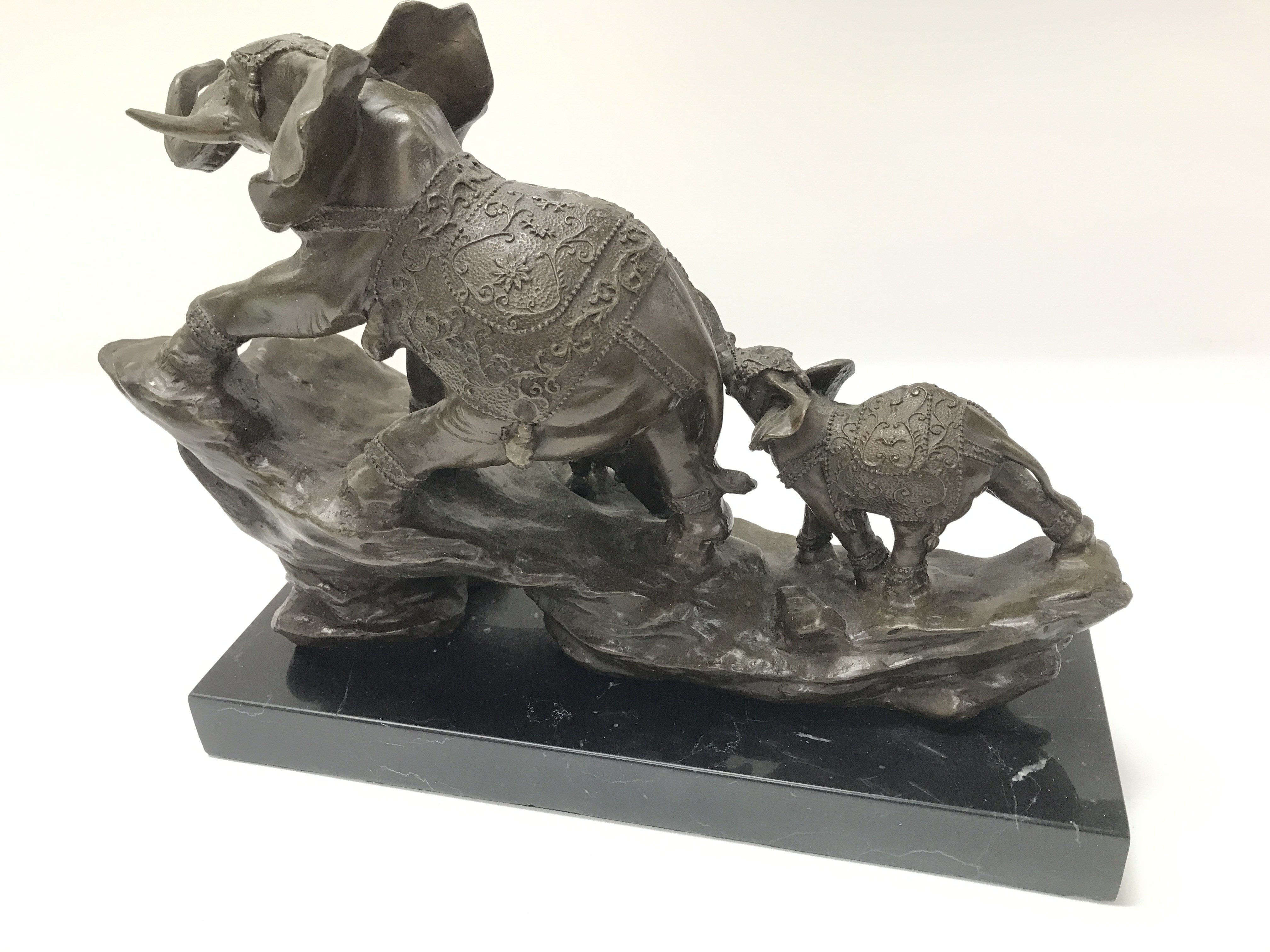 A modern cast bronze elephant figure on a stone ba - Image 3 of 3