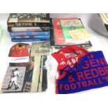 A box of sporting items comprising various signed