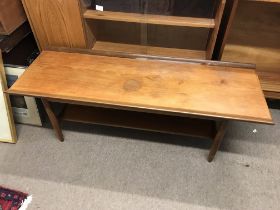 A mid 20th century teak occasional table. 122x42x4