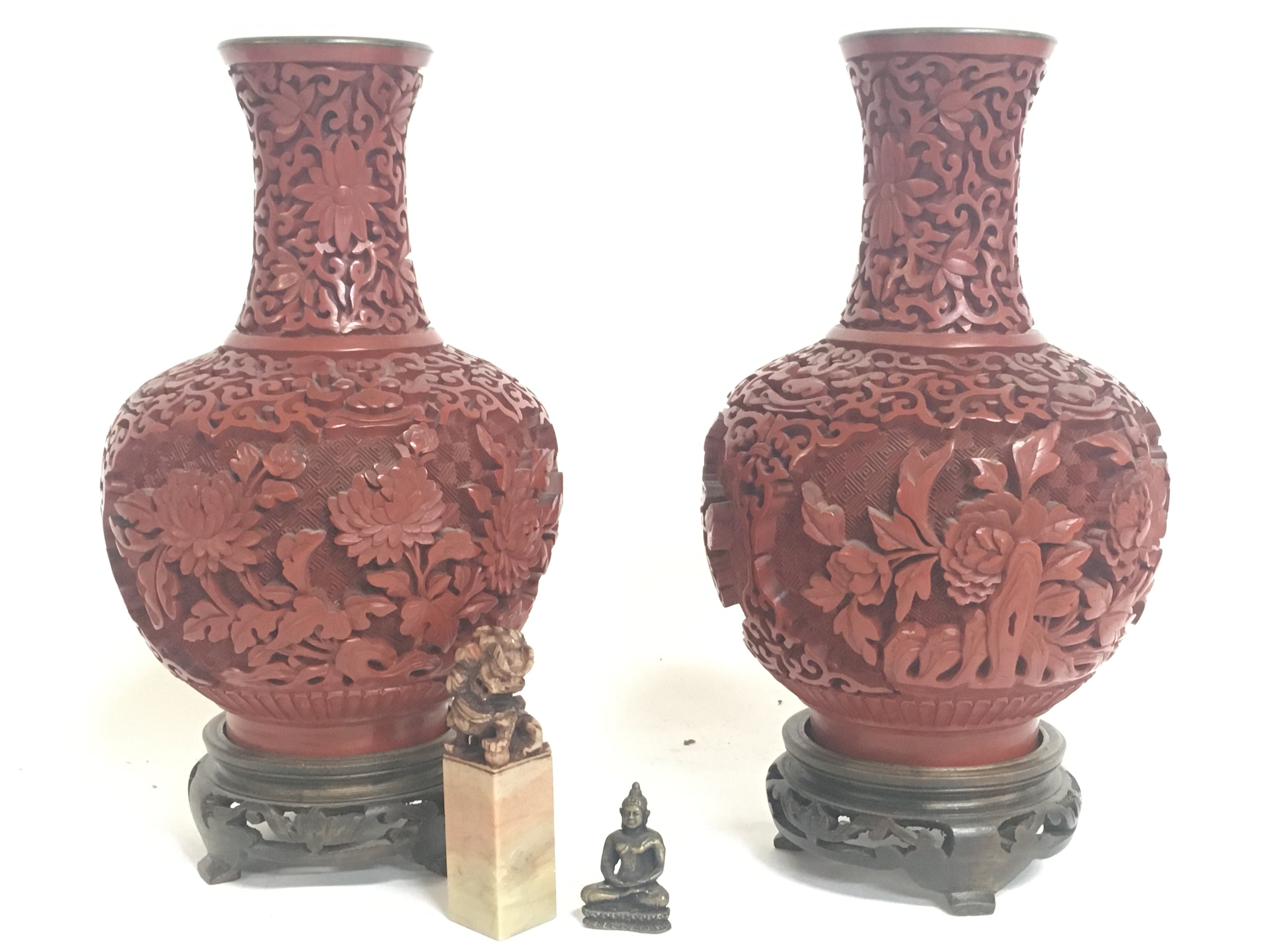 A pair of Chinese Cinnabar Lacquer vases on wooden