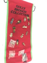 A Collection of golly brooches. Postage category b