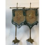 A pair of Victorian tapastry table screens with gilt metal bases. 53cm.