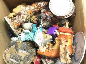 A Box Containing a Collection of Various Ceramics