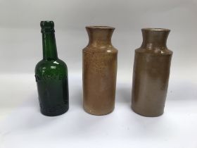 Two stoneware bottles and an 18th century W Carter