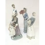 Three large Lladro porcelain figures a nurse a mot