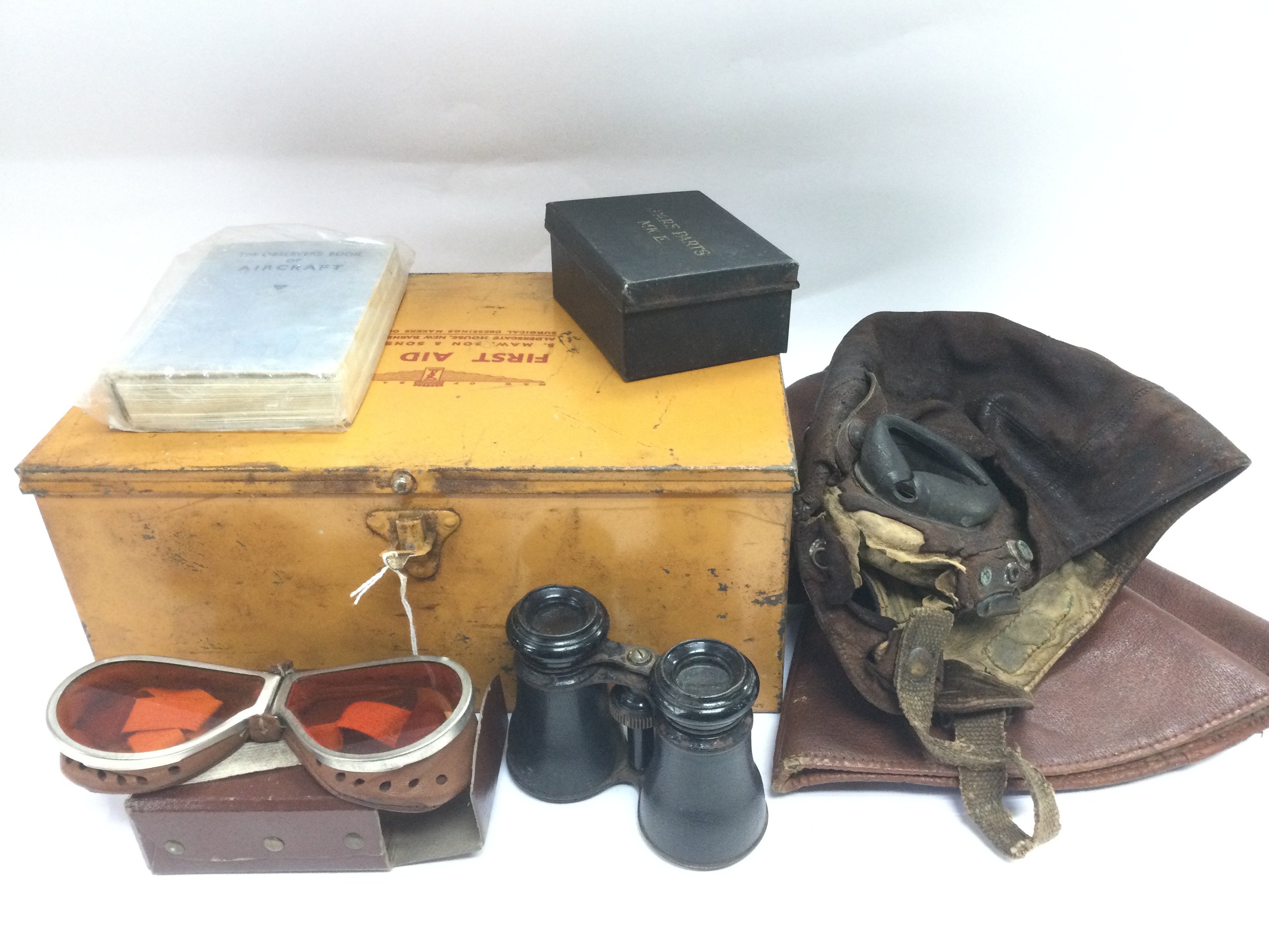 A collection of items comprising a pair of binocul