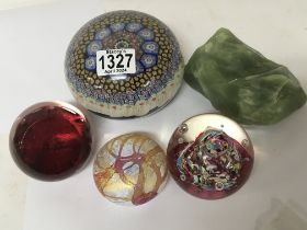 A large millefiori paperweight Caithness paperweights and uncut jade.