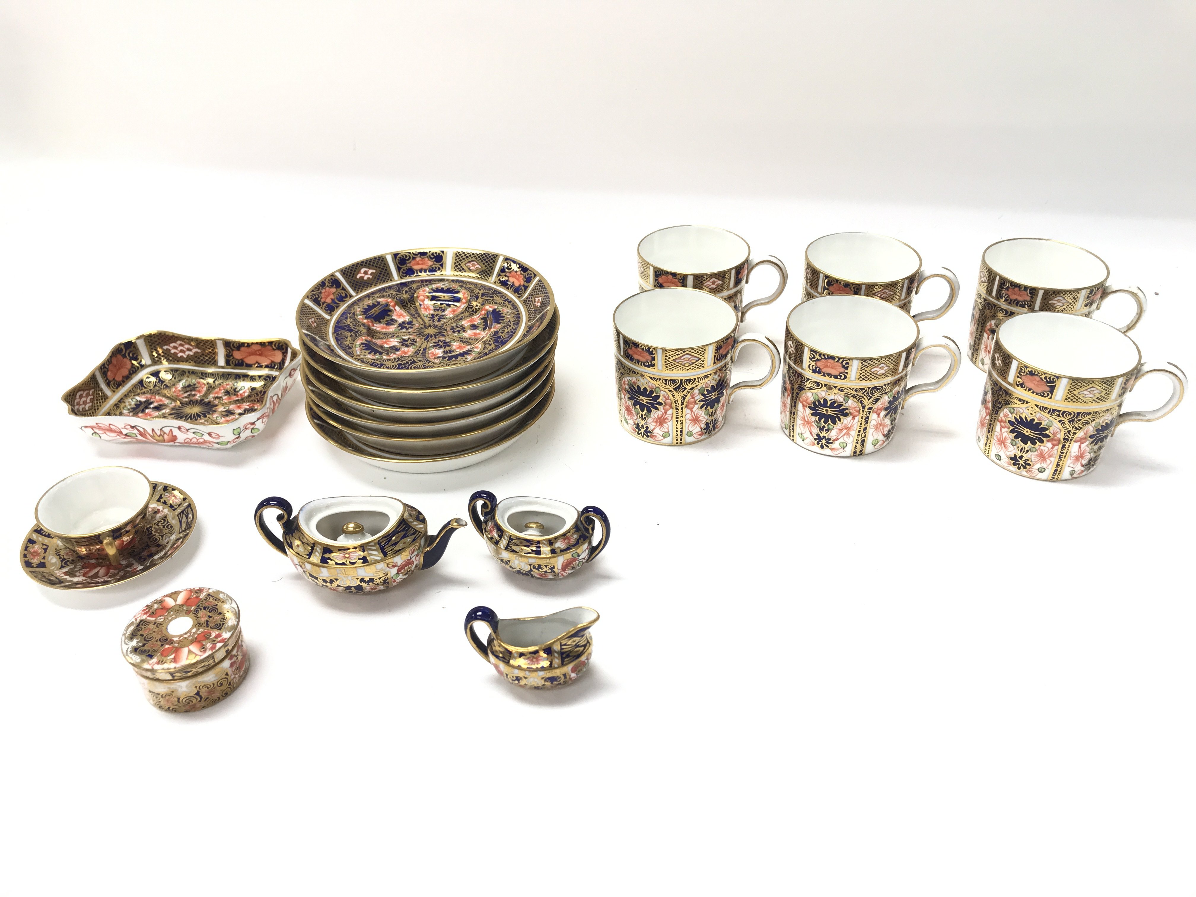 A royal crown derby old Imari coffee set.