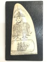 A Scrimshaw Whales tooth with Admiral Lord Nelson