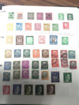 Two albums containing world stamps including 19th