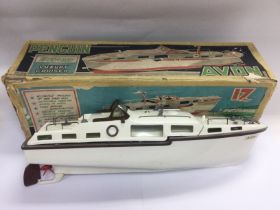 A boxed Avon model of a motorboat. Shipping category B.