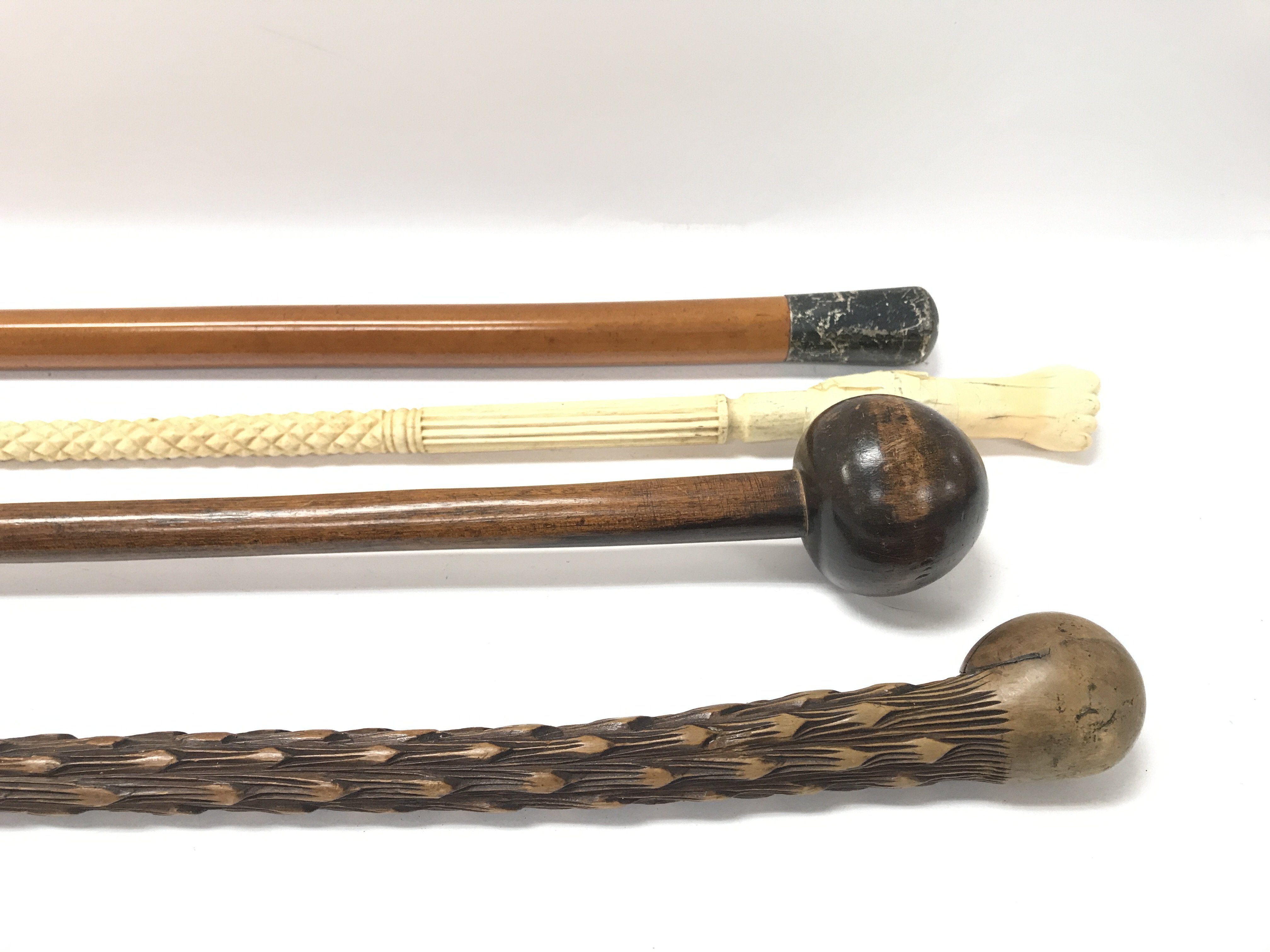 A collection of four walking sticks. - Image 2 of 4