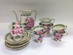 A decorative coffee set in Laurel Time pattern. Shipping category D.