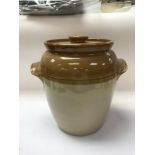 A large stoneware bread bin ,approx 28cm, a small