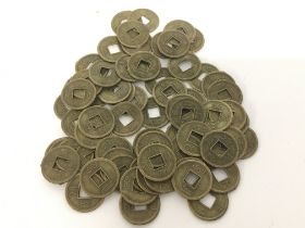 A collection of oriental tokens/fortune coins. No