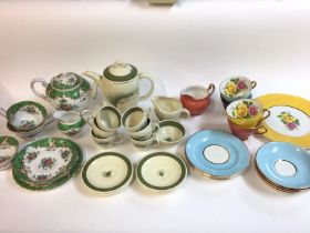 A harlequin tea set along with a Sussie cooper and