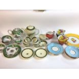 A harlequin tea set along with a Sussie cooper and