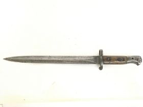 A British Enfield 1903 pattern bayonet , 42cm long