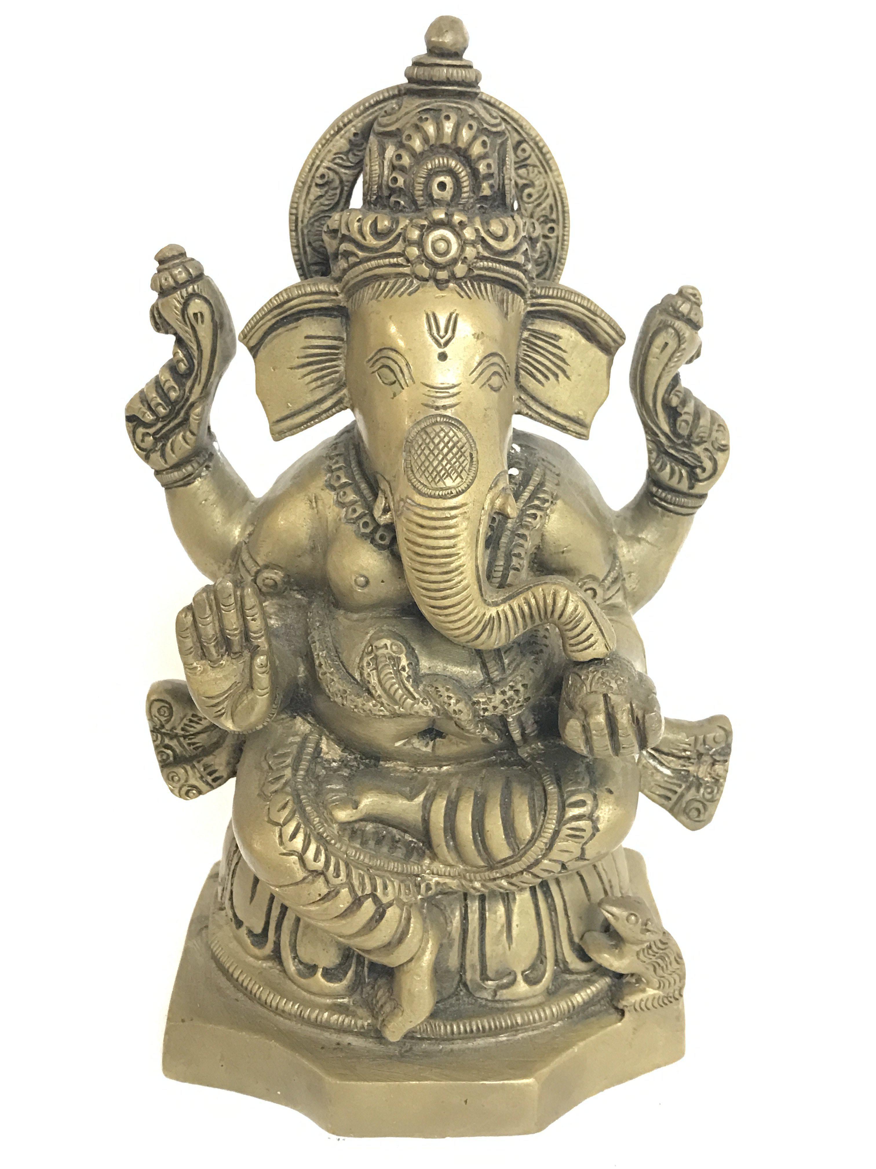 A brass Indian figure of Ganash, approx 19cm tall.