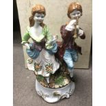 A large Capodimonte figural group, approx height 4