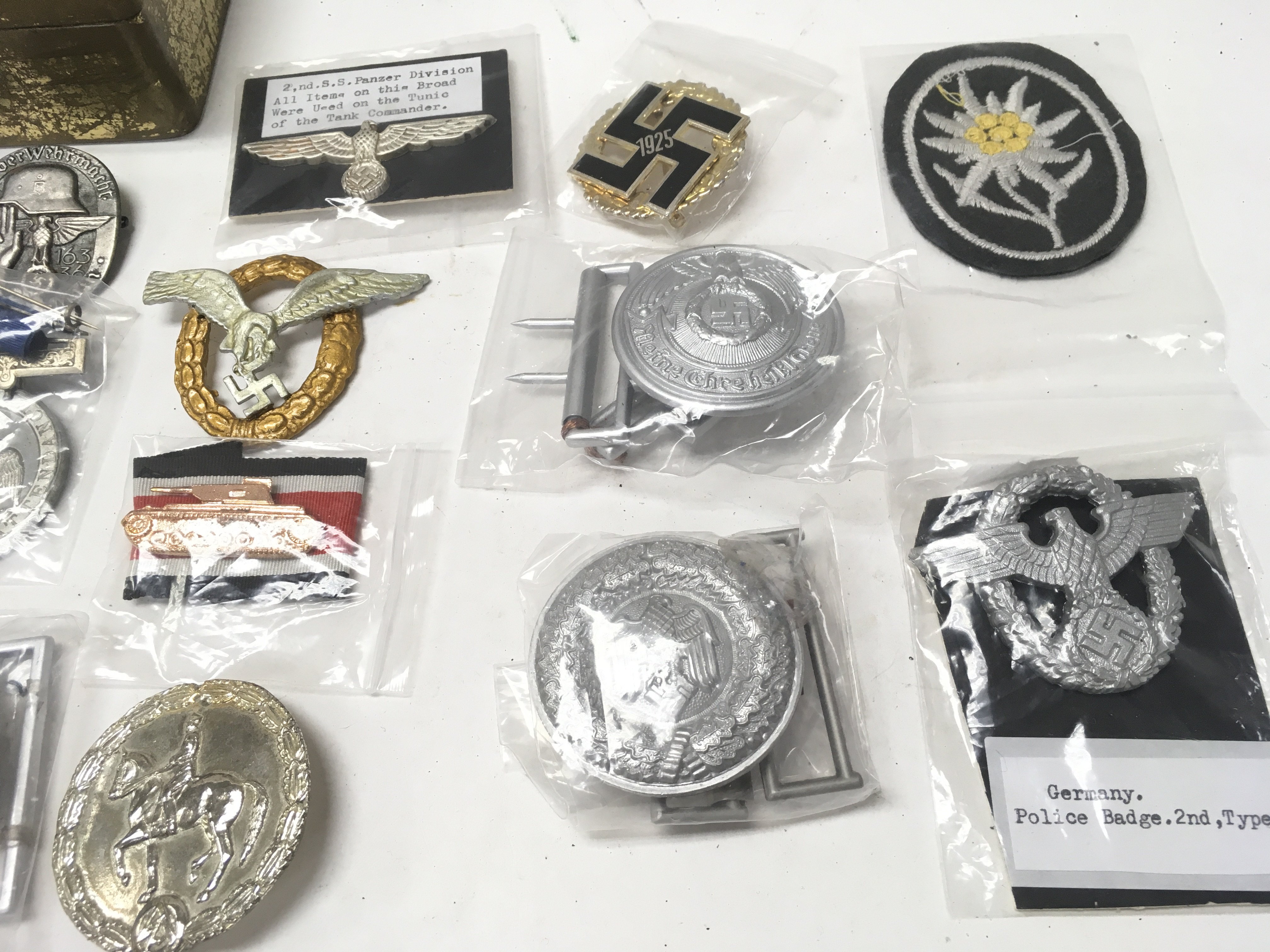 A tin containing German Third Reich badges metal a - Image 3 of 3