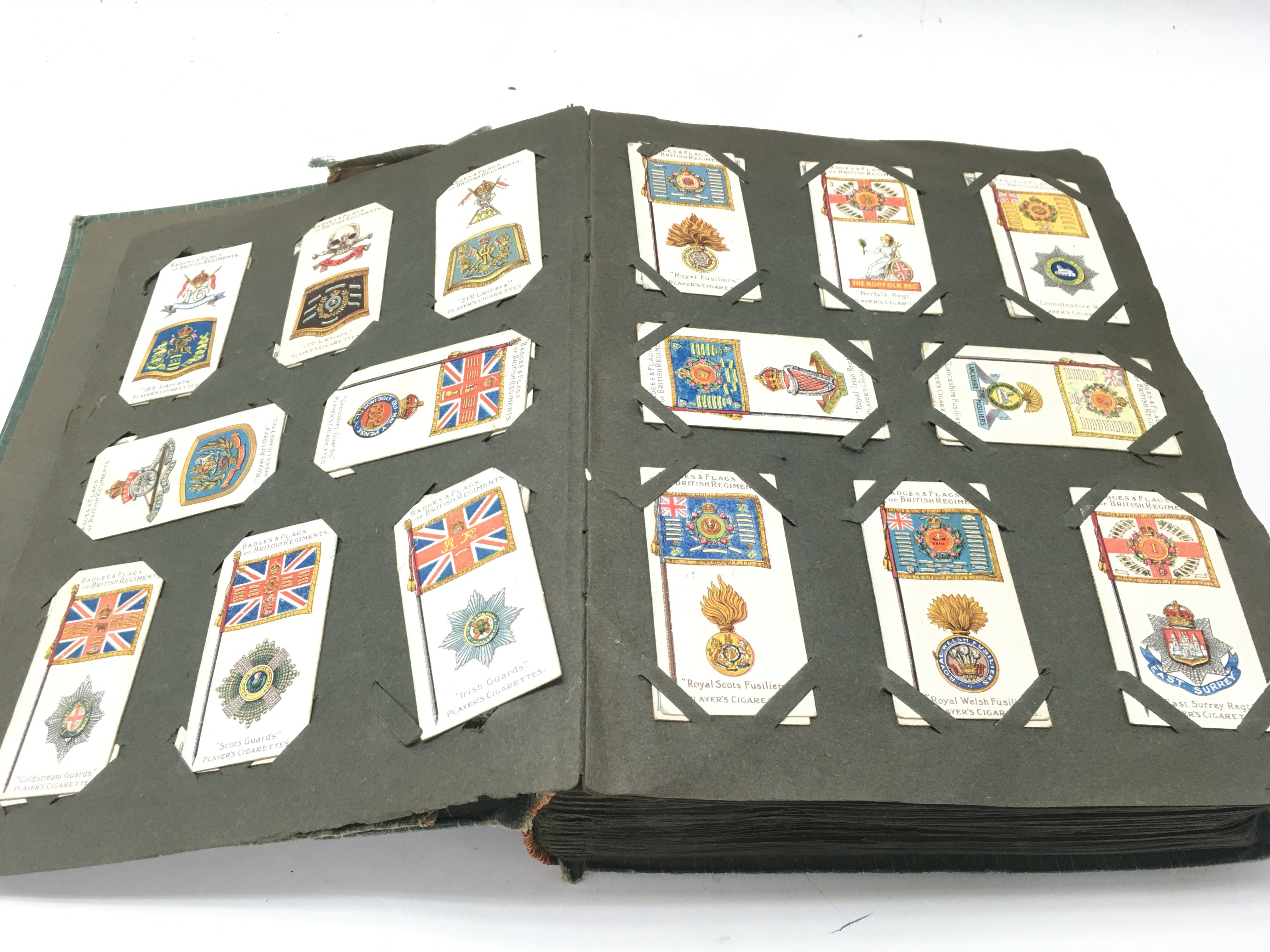 An album containing a large number of vintage cigarette cards. - Image 2 of 12