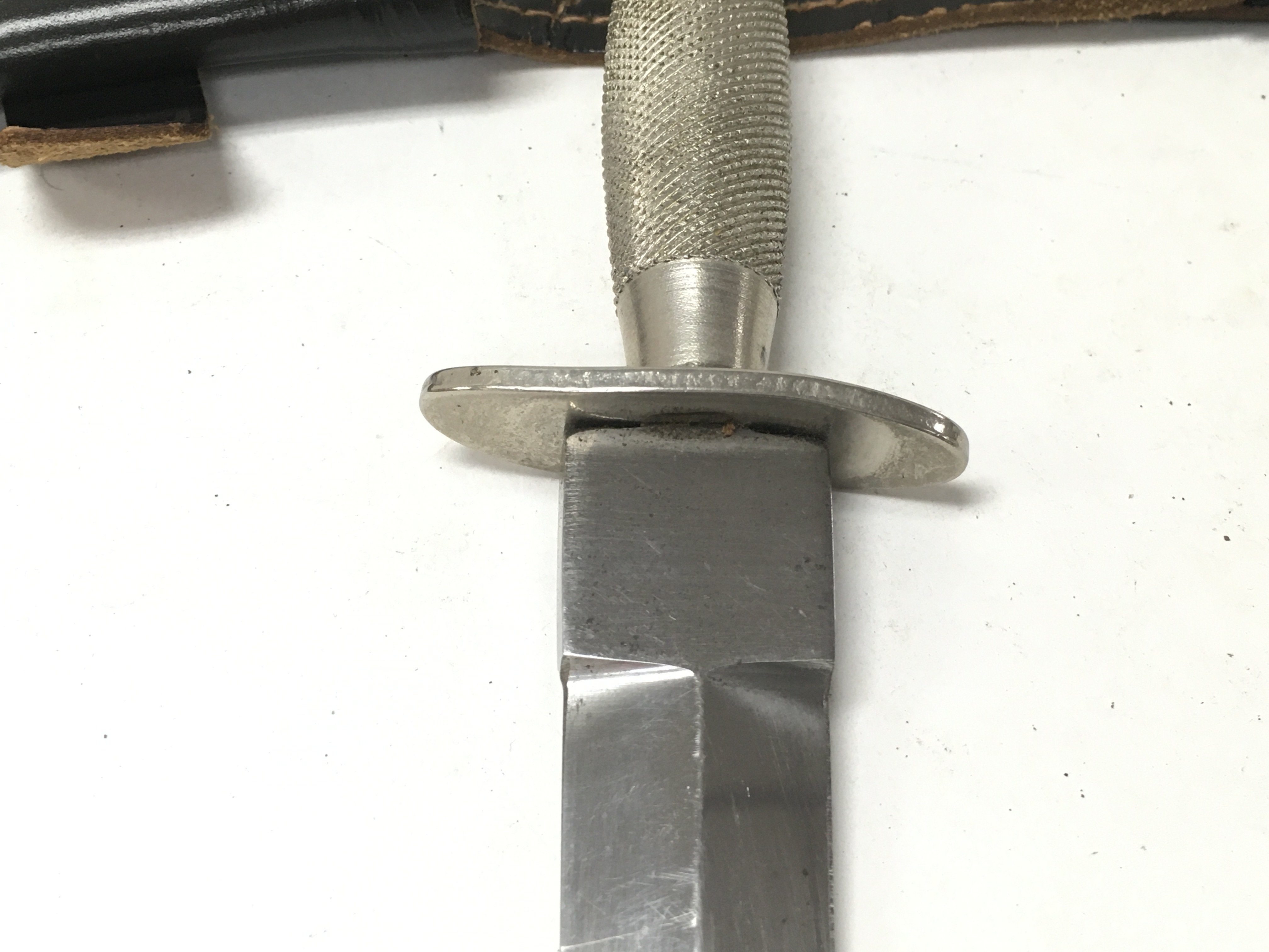 A Fairbairn Sykes fighting knife with leather scab - Image 3 of 4