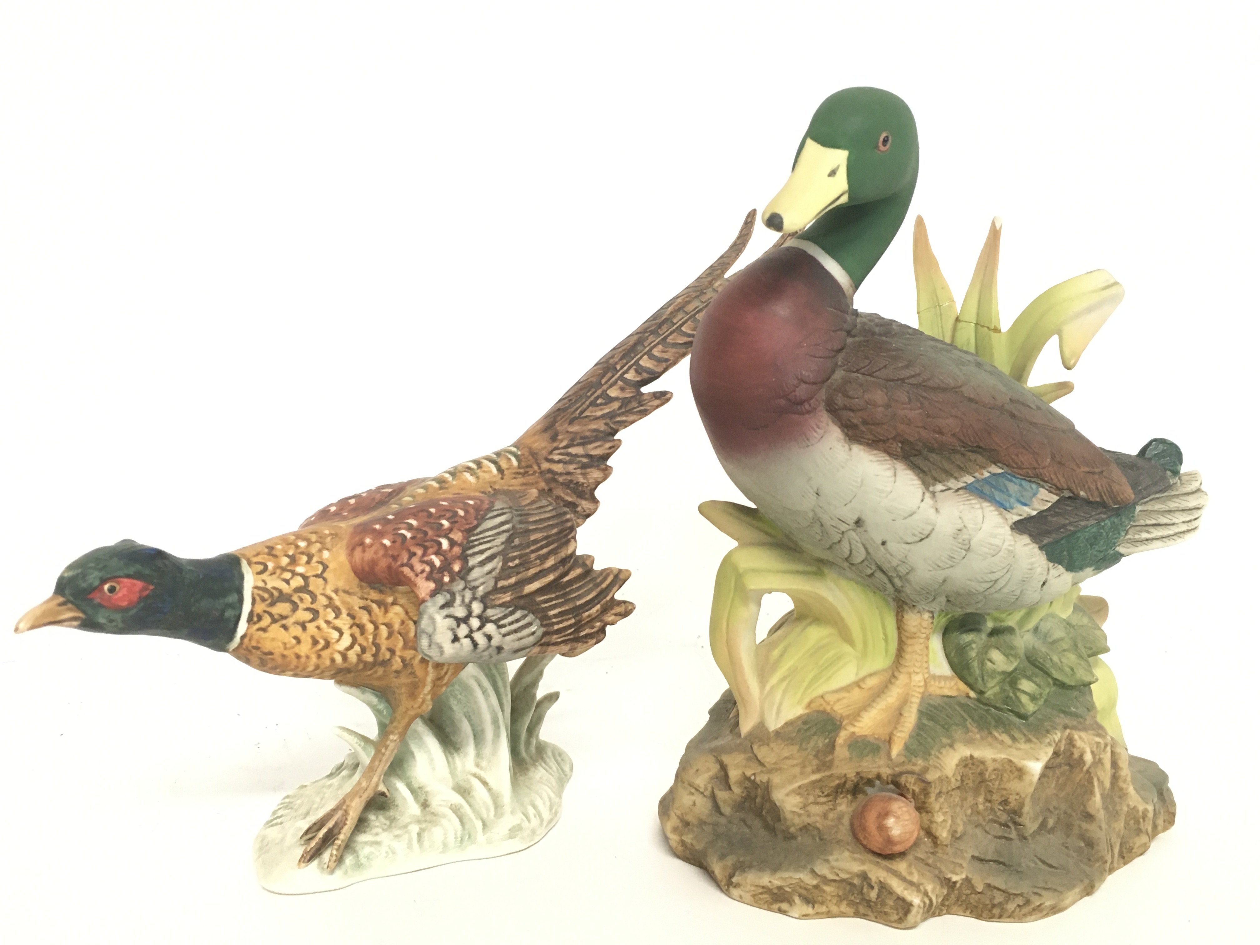 Porcelain figures including a Goebel pheasant and