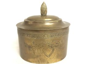 A Victorian oval brass tea caddy,18cm tall. Postag