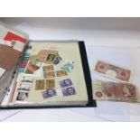 An album of stamps and some bank notes. NO RESERVE