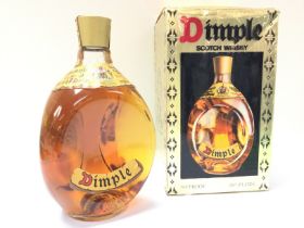 A boxed bottle of Dimple Scotch Whisky , postage c