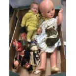 Two composition dolls and small tourist dolls. Shi