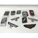 A collection of mostly German cloth badges possibl