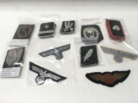 A collection of mostly German cloth badges possibl