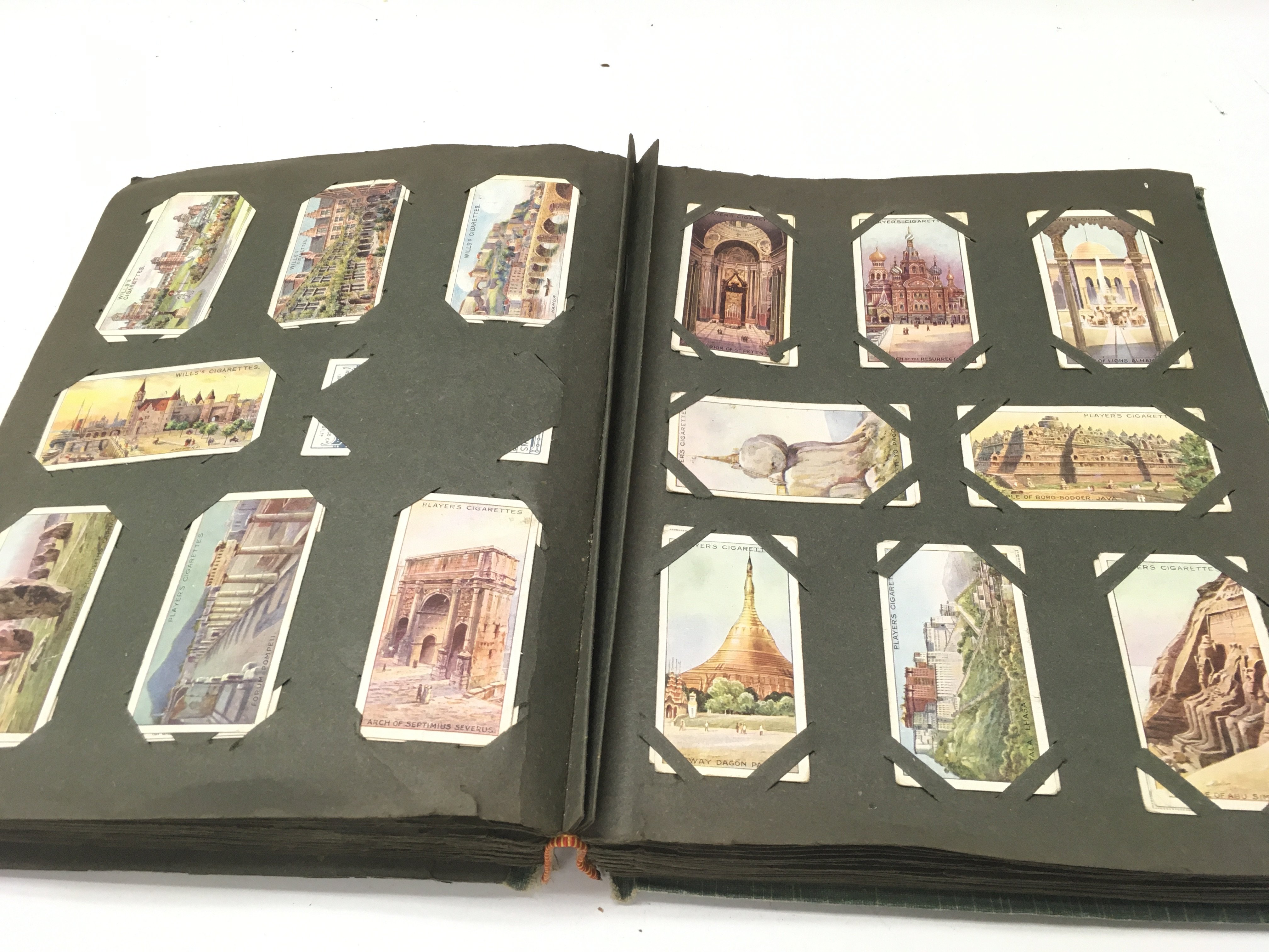 An album containing a large number of vintage cigarette cards. - Image 12 of 12