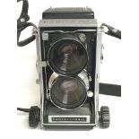 A vintage Mamiya C33 professional camera fitted wi