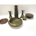A collection of various items of brass wear.