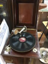 A cased gramophone. This lot cannot be posted