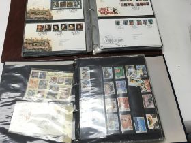 A large collection of first day covers and loose s