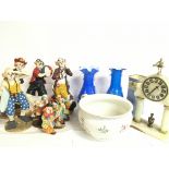 A collection of ceramics including clown figures, coloured art vases, Recta Chelsea vase, celeste