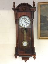 An 8 day mahogany cased wall clock. NO RESERVE