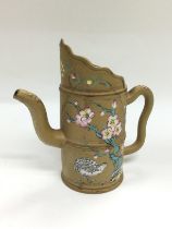 A Yixing teapot with hand painted floral decoratio
